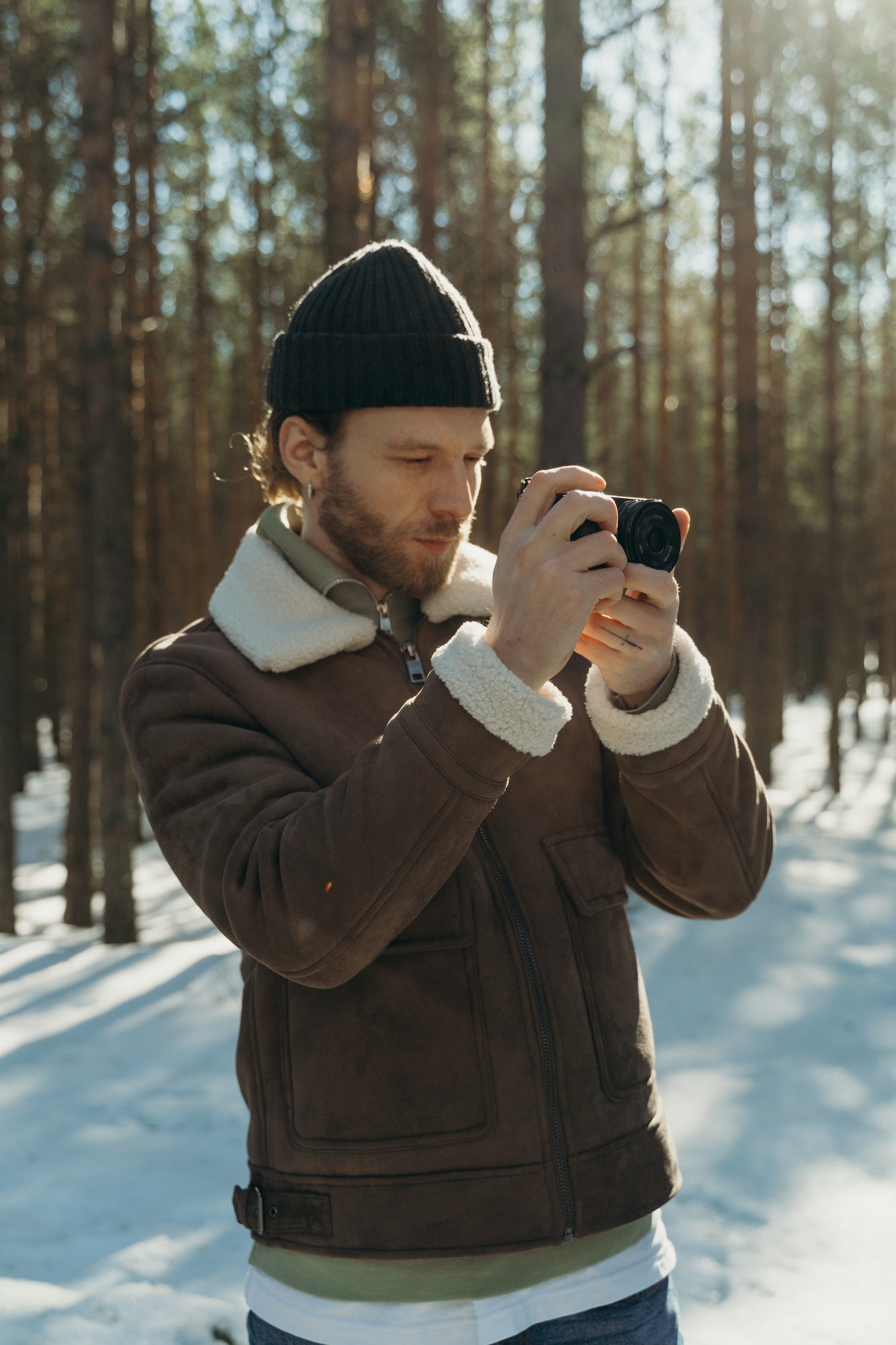 wearing jacket and taking pictures 